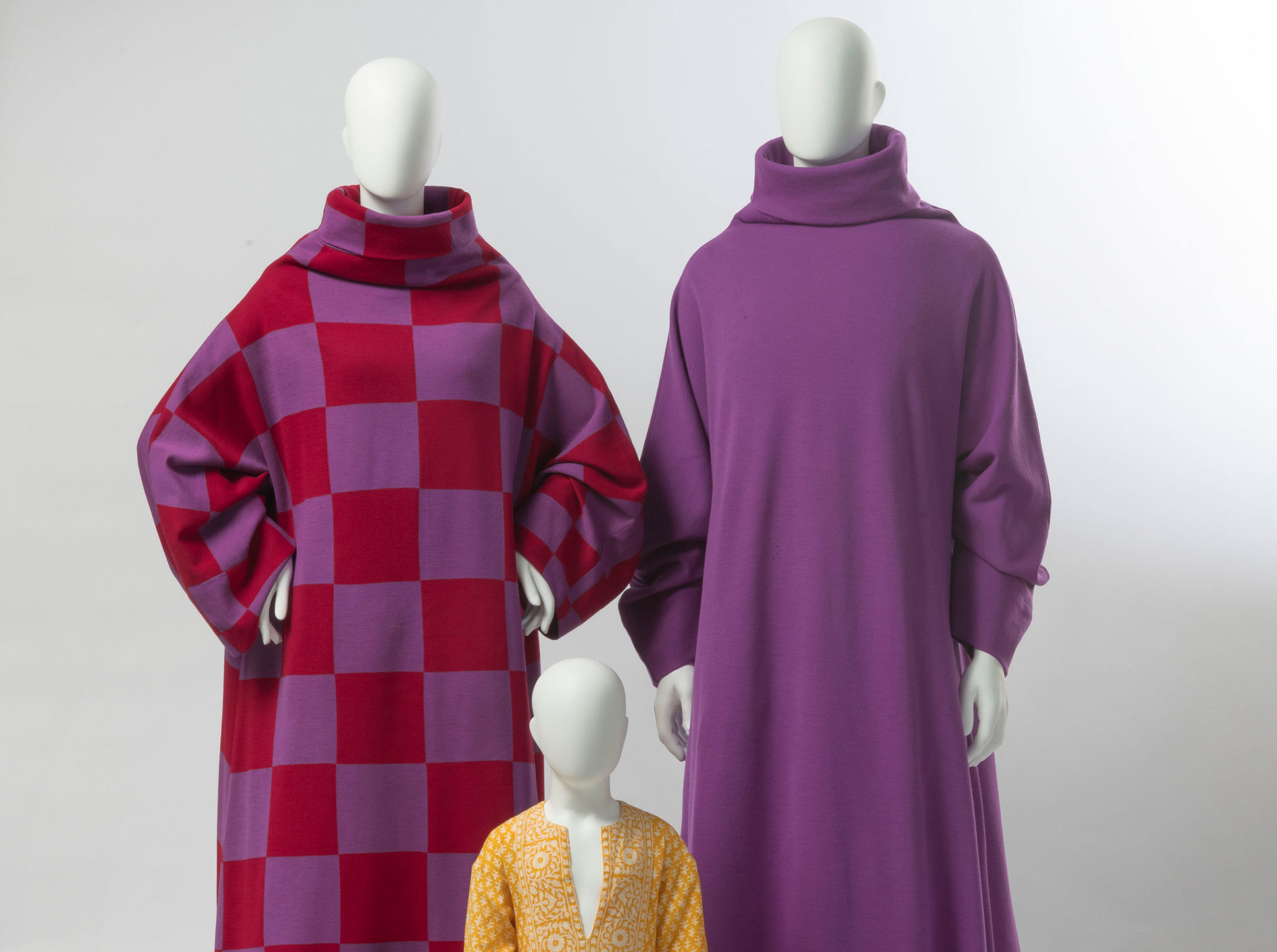 (Left) Rudi Gernreichfor Harmon Knitwear. Caftan, 1970. Wool knit. Collection of Peggy Moffitt. Photo by Robert Wedemeyer. (Center) Rudi Gernreich. Caftan, c. 1973. Printed cotton plain weave. Collection of Peggy Moffitt. Photo by Robert Wedemeyer. (Right) Rudi Gernreichfor Harmon Knitwear. Caftan, 1970. Wool knit. Collection of Peggy Moffitt. Photo by Robert Wedemeyer.