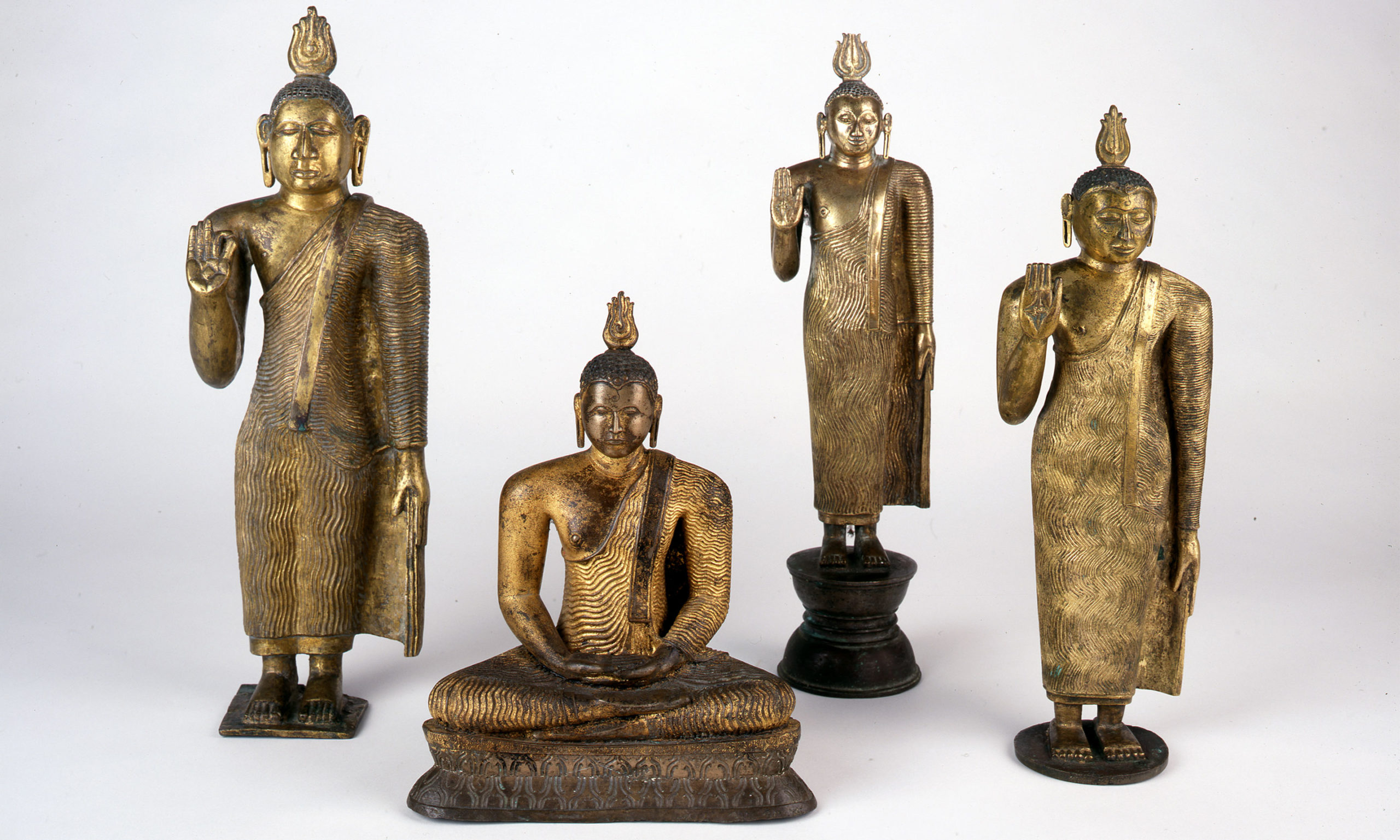 Unknown, Standing Buddha (Buda de pie), Kandyan period, 18th century. Gilt bronze. Gift of the Guardian of the Flame Collection. Photo by Ken Howie.